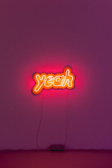 lit-up sign that says Yeah