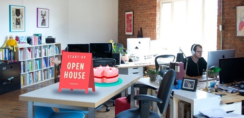 The Say Yeah office with an augmented reality open house sign