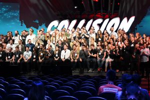 Collision volunteers and staff take a group photo.